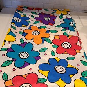Floral fabric huge flowers in red purple orange blue on a white background